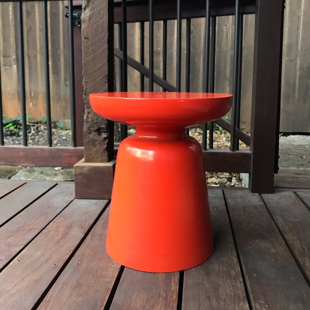 Red metal end table